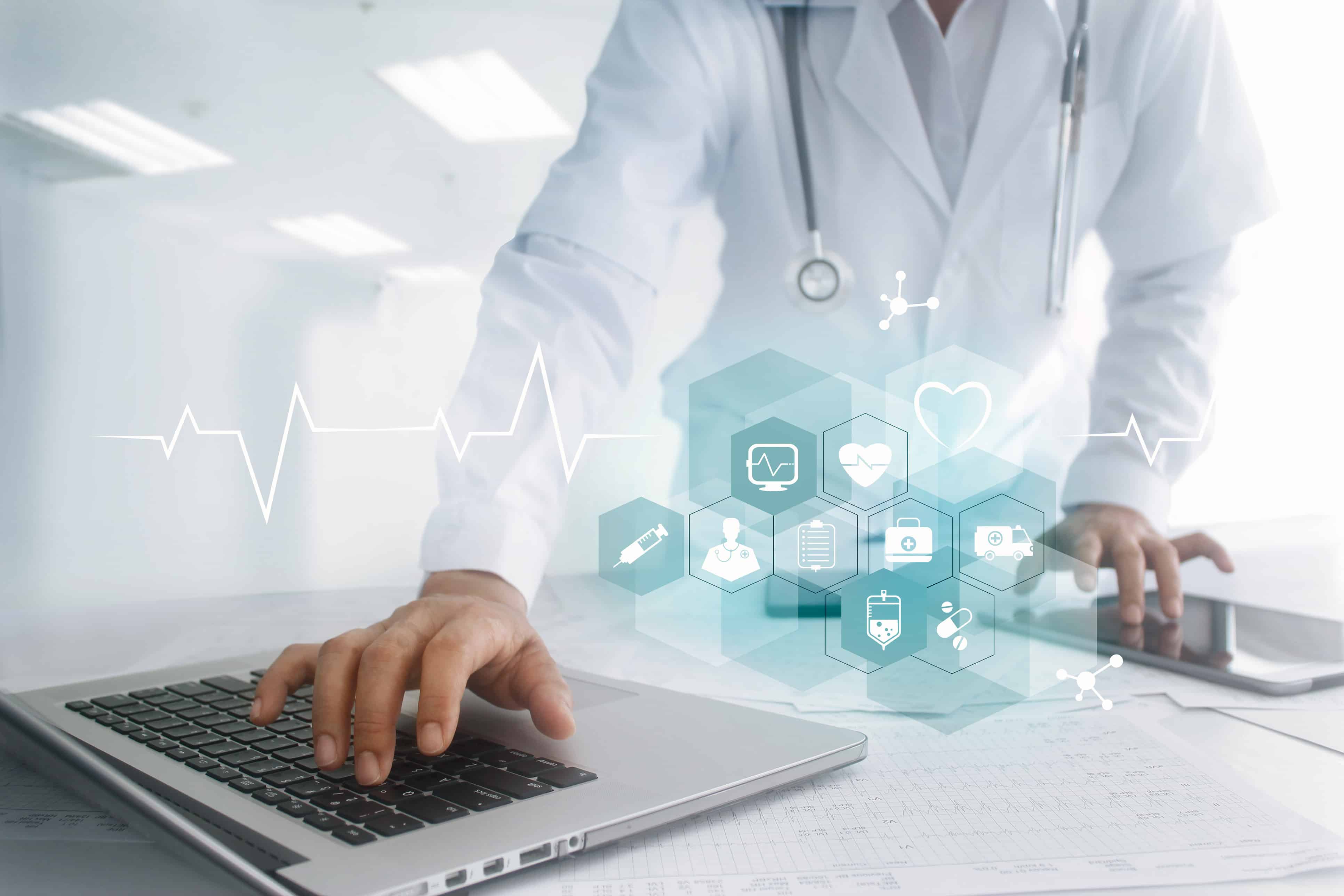 Medicine doctor hand touching laptop and tablet computer interface as medical network connection with icon modern on virtual screen, Digital healthcare, medical technology network and innovation concept