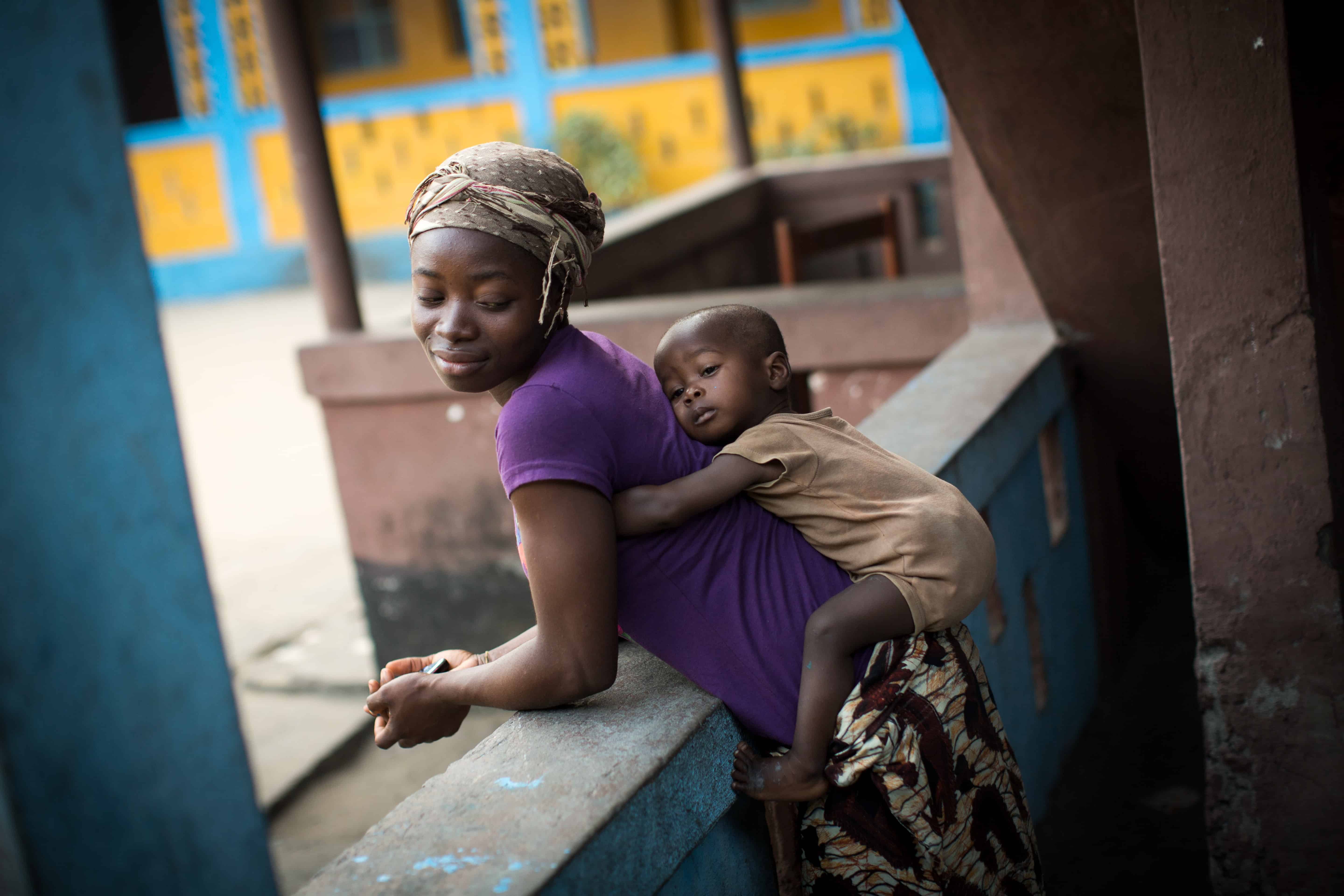New KruTown, Monrovia. Community members that have taken had their babies at or taken their children to Redemption Hospital for treatment. Monrovia/Liberia. Photo Robin Hammond/Panos