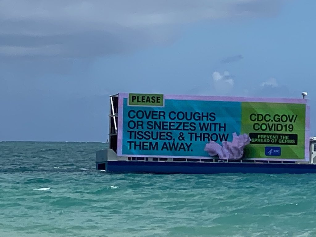 The CDC created floating billboards along the beaches of Miami to warn spring breakers about the spread of COVID-19.