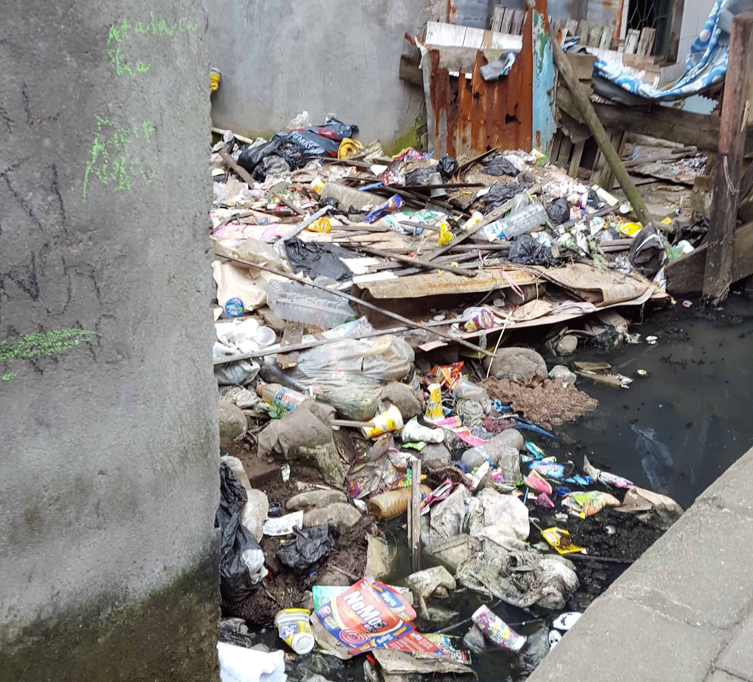 Household garbage dumped in stormwater drain Makassar