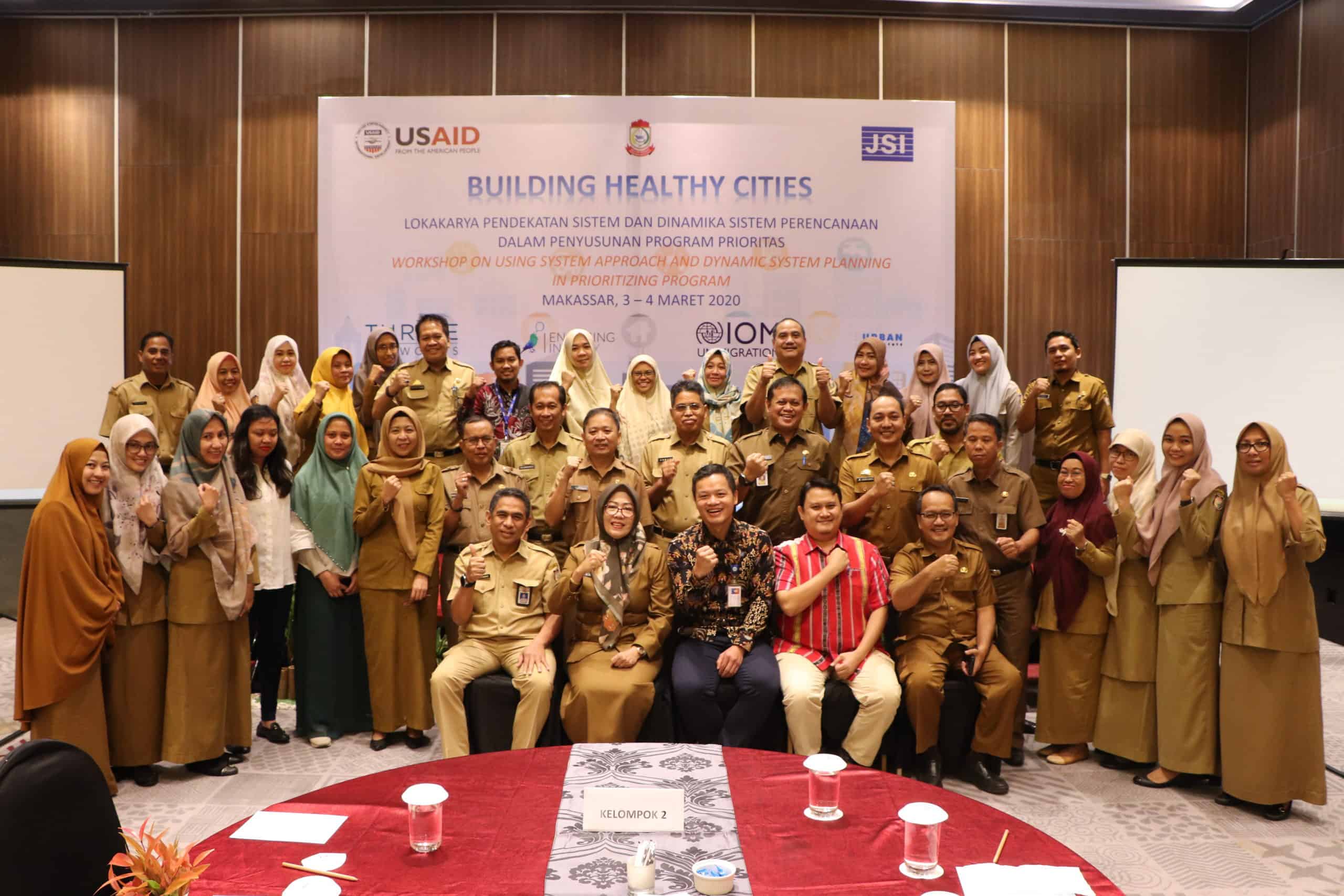 Community participants pose for a photo after a Building Healthy Cities hosted event.