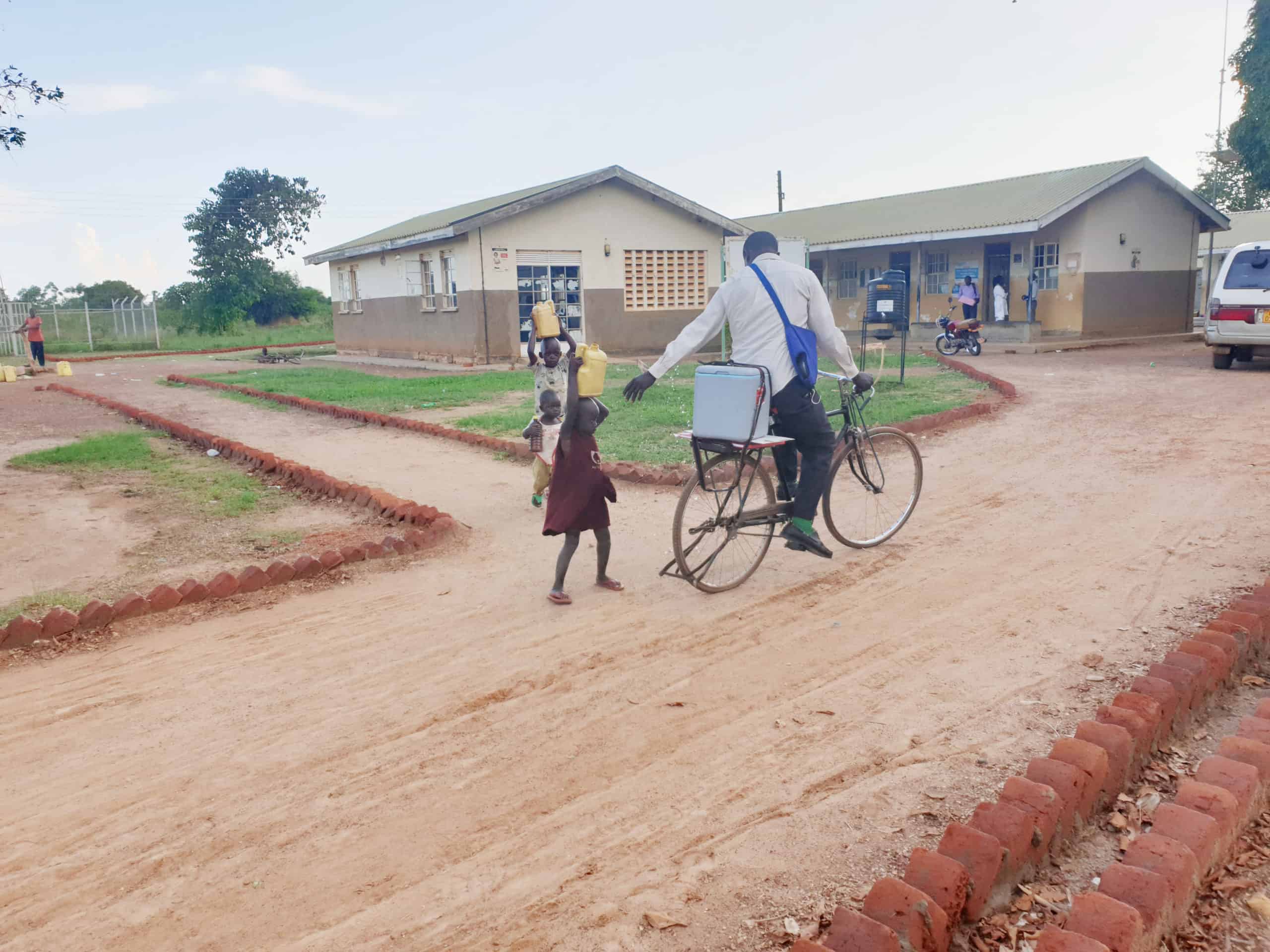 David rides with vaccines to remote villages to vaccinate children whose parents who are unable to come to the facility. 