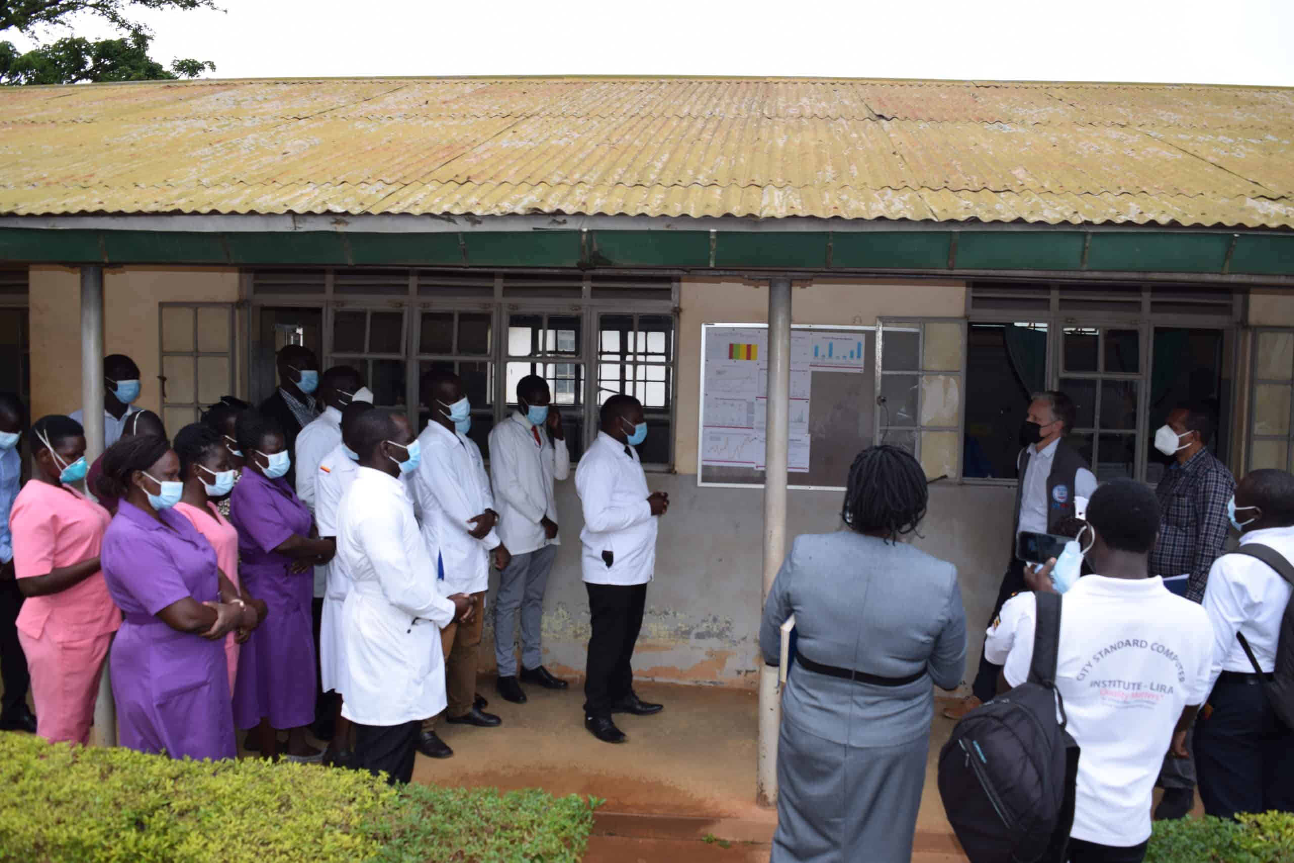 Richard Nelson interacts with health workers at the TB Unit of Lira Regional Referral Hospital on World TB Day, 2022.