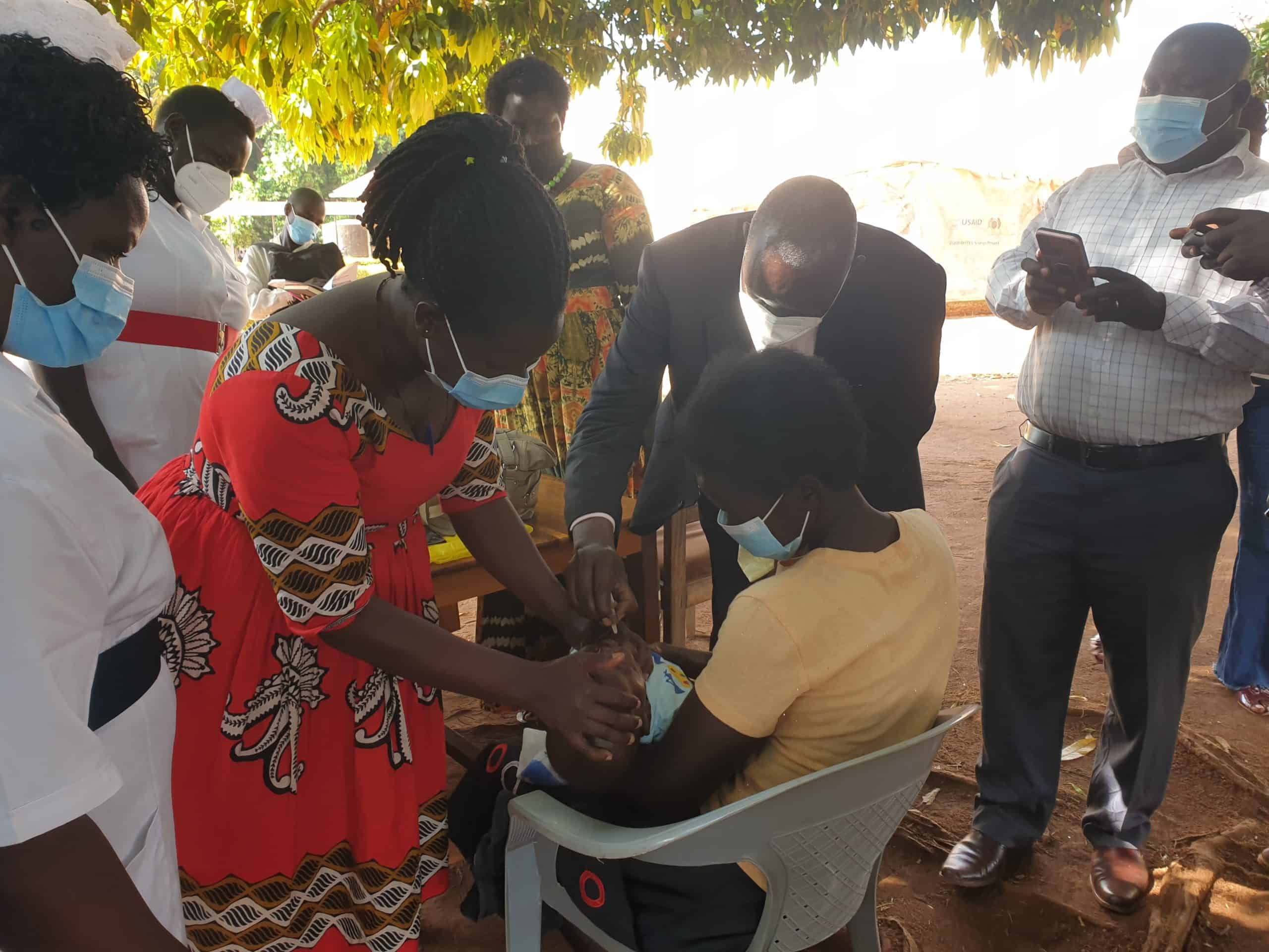 Richard Ogwang Odyero, the resident district commissioner of Kwania launches the polio vaccination exercise. 