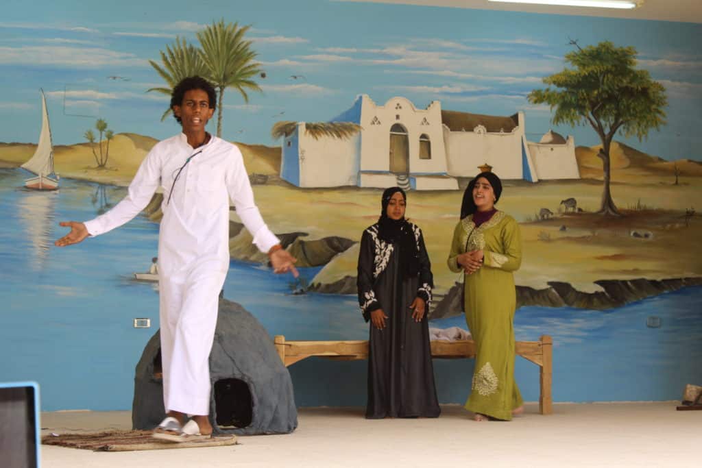 Youth acting in a play