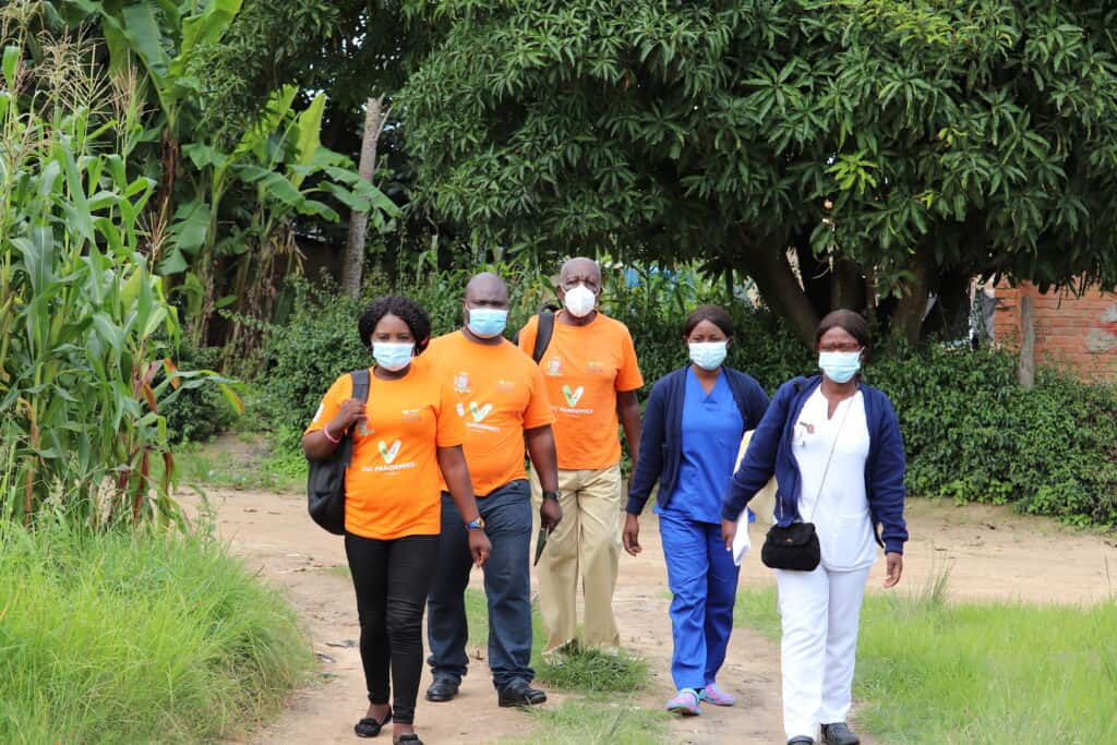 A team of CHWs and Vaccine providers start work moving door-to-door in Chingola