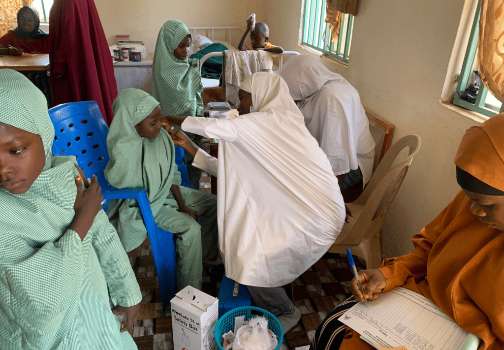 School children in Nigeria receive their HPV vaccines