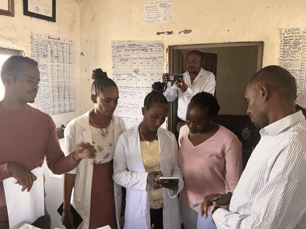 Health extension workers demonstrate eCHIS for Ethiopian health post staff.
