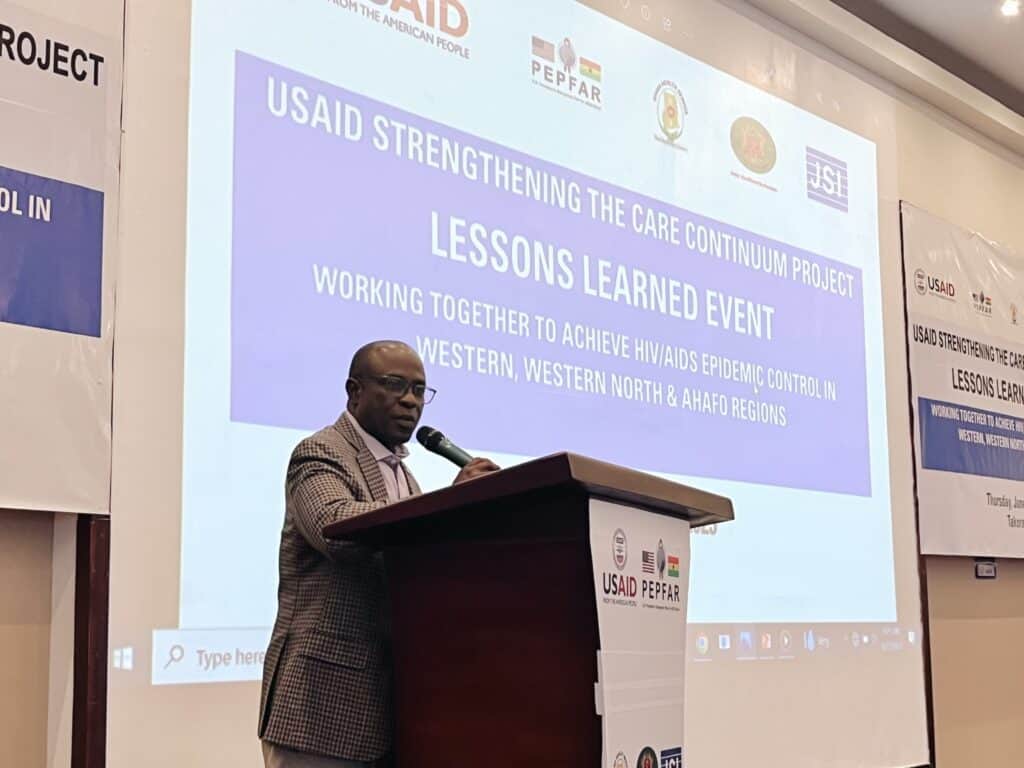 Henry Ajewi-Narh Nagai, USAID Care Continuum Chief of Party providing remarks at the project’s Lessons Learned event.