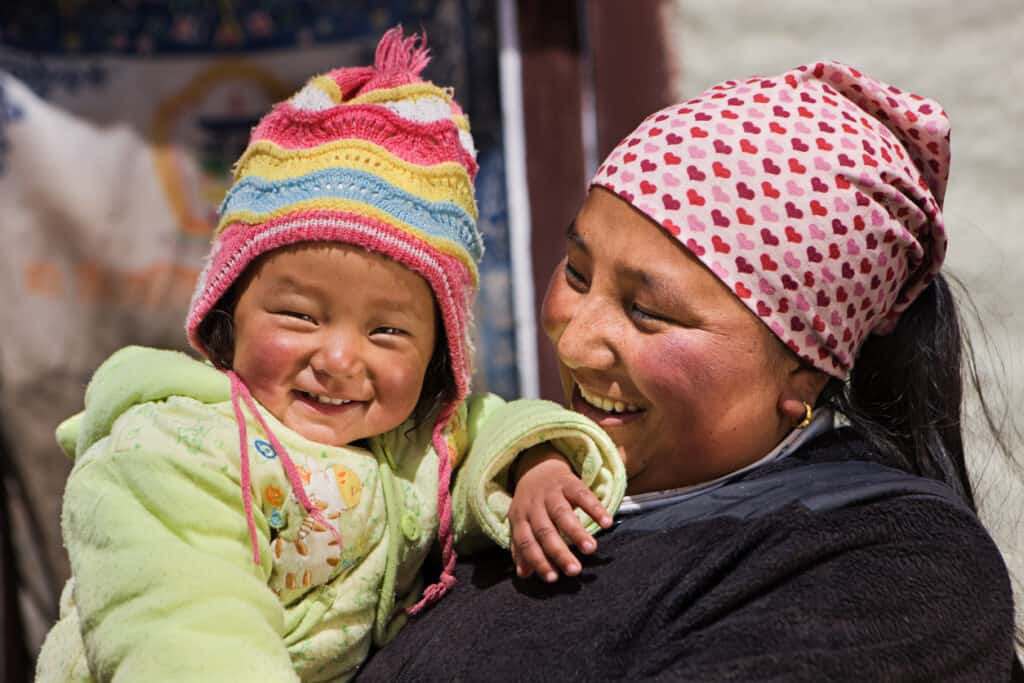 Nepali woman with her baby