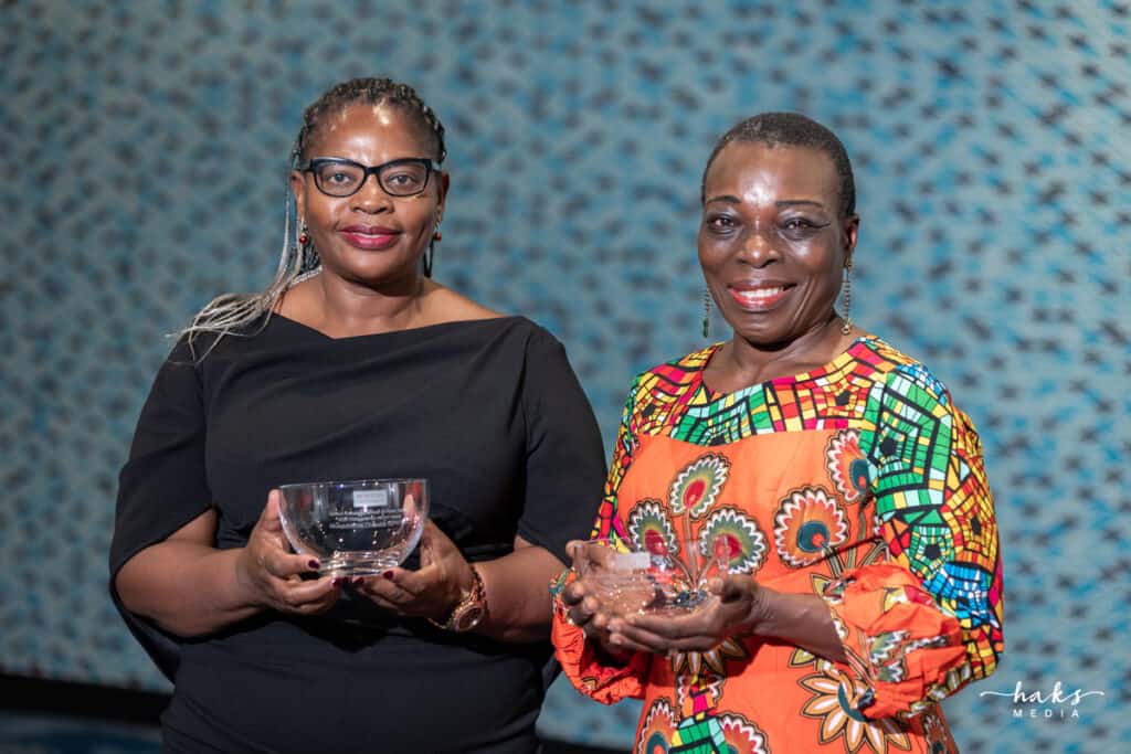 Muka Chikuba-McLeod (left) and Kate Onyejekwe (right) receive this year's BU School of Public Health Distinguished Alumni Award.