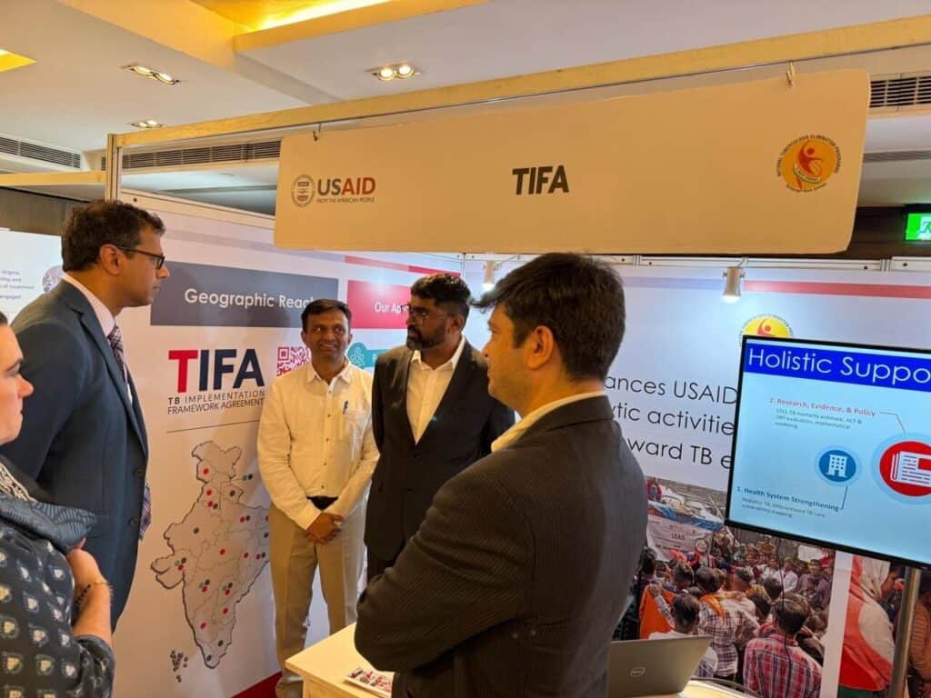 USAID Assistant Administrator Dr. Atul Gawande speaks with members of the TIFA team during an event commemorating 25 years of USAID’s collaboration with India’s National Tuberculosis Elimination Program.